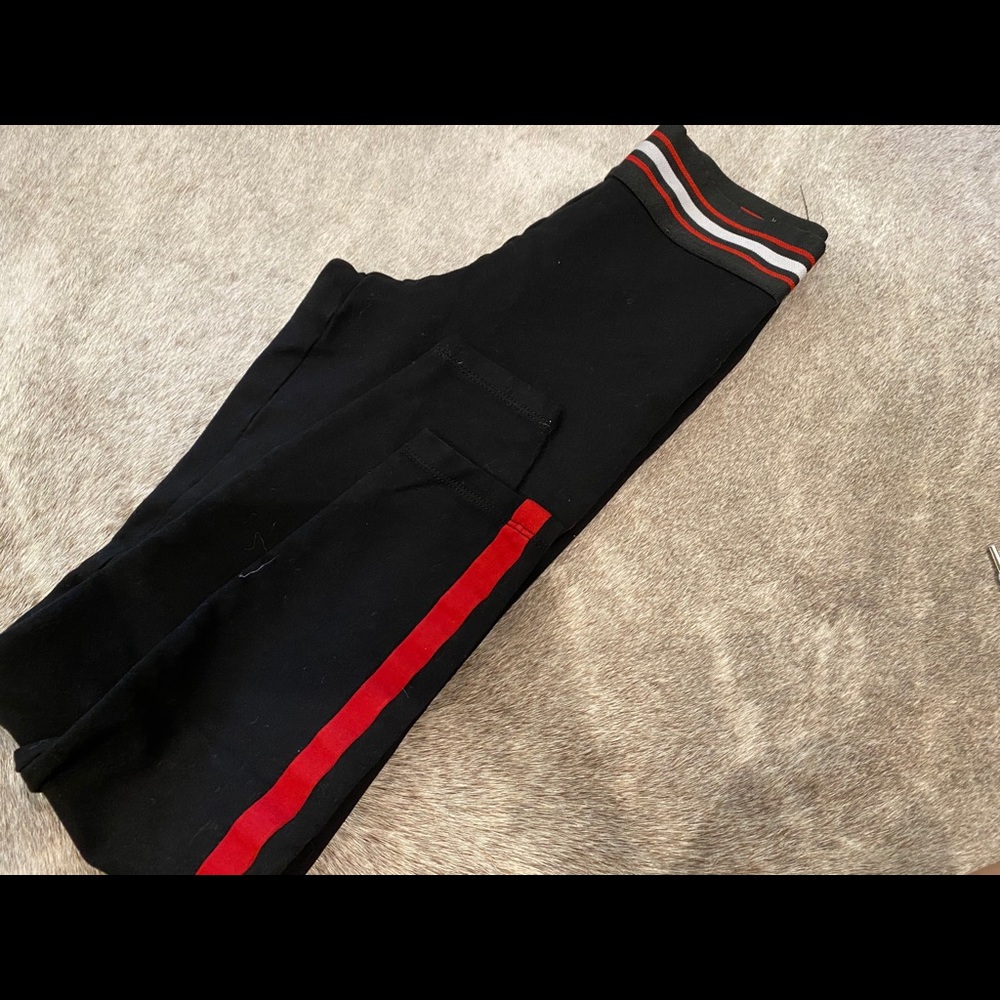 Black and red leggings from Ci Sono. Size small.